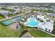 Aerial view of community amenities including pool and sports courts at 16714 Savory Mist Cir, Bradenton, FL 34211