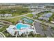 Resort-style pool, tennis, and basketball courts with playground at 16714 Savory Mist Cir, Bradenton, FL 34211