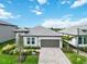 Single-Gathering home with a gray roof and a two-car garage at 16714 Savory Mist Cir, Bradenton, FL 34211