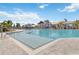 Resort-style pool with a shallow entry and a clubhouse in the background at 16714 Savory Mist Cir, Bradenton, FL 34211