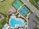 Aerial view of community pool, playground, and sports courts at 16714 Savory Mist Cir, Bradenton, FL 34211