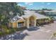 Community clubhouse with tennis courts and parking at 280 Hidden Bay Dr # 201, Osprey, FL 34229