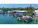 Community boat dock with multiple slips for water access at 280 Hidden Bay Dr # 201, Osprey, FL 34229