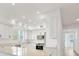 Modern kitchen with island and stainless steel appliances at 280 Hidden Bay Dr # 201, Osprey, FL 34229