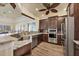 Community kitchen with stainless steel appliances at 280 Hidden Bay Dr # 201, Osprey, FL 34229
