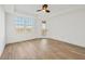 Spacious bedroom with large windows and private balcony access at 280 Hidden Bay Dr # 201, Osprey, FL 34229