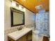 Clean bathroom with updated vanity and tile at 3029 Homasassa Rd, Sarasota, FL 34239