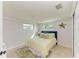 Serene bedroom featuring a queen-size bed at 3029 Homasassa Rd, Sarasota, FL 34239