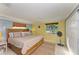 Spacious bedroom with large window and tiled floors at 3029 Homasassa Rd, Sarasota, FL 34239