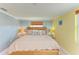 Main bedroom with a king-size bed and two nightstands at 3029 Homasassa Rd, Sarasota, FL 34239