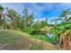 Peaceful view of a canal and lush landscaping at 3029 Homasassa Rd, Sarasota, FL 34239