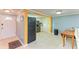 Bright entryway with tile flooring and access to the kitchen at 3029 Homasassa Rd, Sarasota, FL 34239
