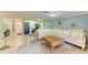 Open concept living space with a sectional sofa and view into the kitchen at 3029 Homasassa Rd, Sarasota, FL 34239