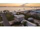 Aerial view of waterfront home with sunset views and RV parking at 4528 106Th W St, Bradenton, FL 34210