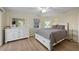 Bright bedroom with dresser and comfortable bed at 4528 106Th W St, Bradenton, FL 34210
