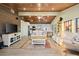 Open living space with vaulted ceilings and wood floors at 4528 106Th W St, Bradenton, FL 34210
