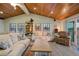 Open living area with vaulted wood ceilings at 4528 106Th W St, Bradenton, FL 34210