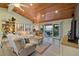 Bright living room with water views, comfy seating, and hardwood floors at 4528 106Th W St, Bradenton, FL 34210
