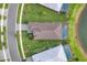 Bird's-eye view of single-Gathering home with pool and lush landscaping at 4939 Surfside Cir, Bradenton, FL 34211
