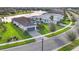 Stunning aerial view of home with lake access at 4939 Surfside Cir, Bradenton, FL 34211