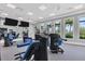 State-of-the-art fitness center offers various exercise equipment and large windows at 4939 Surfside Cir, Bradenton, FL 34211