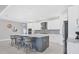 Spacious kitchen featuring a large island and white cabinetry at 4939 Surfside Cir, Bradenton, FL 34211