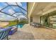 Spacious pool and patio area with lake view at 4939 Surfside Cir, Bradenton, FL 34211