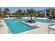 Relaxing resort-style pool with spacious deck and comfortable seating areas at 4939 Surfside Cir, Bradenton, FL 34211