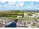 Aerial view showing home's location in a waterfront community at 502 Woodstork Cir, Bradenton, FL 34209