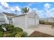 House exterior with double garage and landscaped front yard at 502 Woodstork Cir, Bradenton, FL 34209