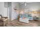 Living area with light blue sofa and coastal-themed decor at 502 Woodstork Cir, Bradenton, FL 34209