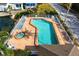 Relaxing community pool and hot tub area with surrounding patio at 502 Woodstork Cir, Bradenton, FL 34209