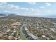 A breathtaking aerial view of a coastal community surrounded by water at 5159 Oxford Dr, Sarasota, FL 34242