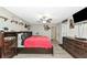 King-size bed, large TV, and ample closet space at 7404 Mill Hopper Ct, Palmetto, FL 34221