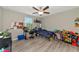 bedroom with a twin bed and ample floor space at 7404 Mill Hopper Ct, Palmetto, FL 34221
