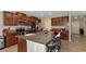 Kitchen with granite counters and stainless steel appliances at 7404 Mill Hopper Ct, Palmetto, FL 34221