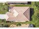 Aerial view of a house with tile roof at 8472 Gateway Ct, Englewood, FL 34224