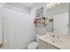 Clean bathroom with shower/tub combo, toilet and vanity at 8472 Gateway Ct, Englewood, FL 34224