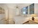 Guest bedroom with ample closet space at 1065 Gulf Of Mexico Dr # 201, Longboat Key, FL 34228