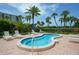 Enjoy this relaxing hot tub with surrounding lounge chairs at 1065 Gulf Of Mexico Dr # 201, Longboat Key, FL 34228