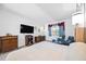 Bright and airy bedroom with a king-size bed and ample closet space at 11907 Petunia Ter, Bradenton, FL 34212