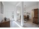 Elegant dining room with a formal table and views of the entryway at 11907 Petunia Ter, Bradenton, FL 34212