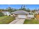 Single story home with attached garage and fenced backyard at 161 Sandhurst Dr, Venice, FL 34293