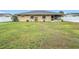 House exterior and large backyard at 161 Sandhurst Dr, Venice, FL 34293