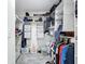 Well-organized walk-in closet with shelving and hanging rods at 161 Sandhurst Dr, Venice, FL 34293