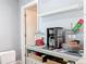 Coffee bar with coffee maker and beverage supplies at 161 Sandhurst Dr, Venice, FL 34293