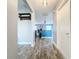Bright and airy entryway with wood-look tile flooring at 161 Sandhurst Dr, Venice, FL 34293