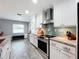 Modern kitchen with stainless steel appliances and granite countertops at 161 Sandhurst Dr, Venice, FL 34293