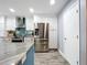 Modern kitchen with stainless steel appliances and granite countertops at 161 Sandhurst Dr, Venice, FL 34293
