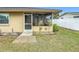 Screened porch with access from backyard at 161 Sandhurst Dr, Venice, FL 34293